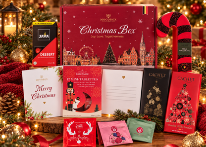 Moodbox Christmas Gift Box featuring Belgian chocolate, premium coffee, tea and festive sweet treats, beautifully presented in elegant Christmas packaging with a personalized Merry Christmas message card. A premium Christmas gift for family, friends, employees, clients and business partners, with delivery across Europe.