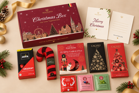 Moodbox Christmas Gift Box featuring Belgian chocolate, premium coffee, tea and festive sweet treats, beautifully presented in elegant Christmas packaging with a personalized Merry Christmas message card. A premium Christmas gift for family, friends, employees, clients and business partners, with delivery across Europe.