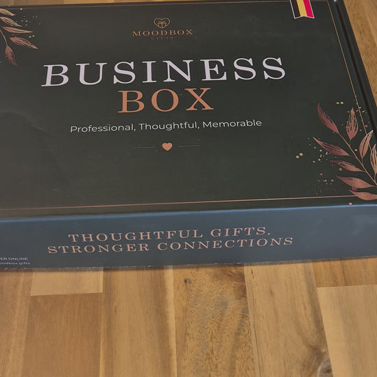 Moodbox Business Gift Box featuring Belgian chocolate, premium coffee, tea and high-quality sweet treats in an elegant premium presentation with a personalized message card. An ideal corporate gift for employees, clients, colleagues and business partners, with delivery available across Europe.