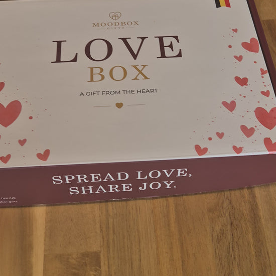 Moodbox Love Gift Box with Belgian chocolate, premium coffee, tea and carefully selected sweet treats, presented in an elegant gift box with a personalized message card. A romantic gift for your partner, husband, wife or someone special, with delivery available across Europe.