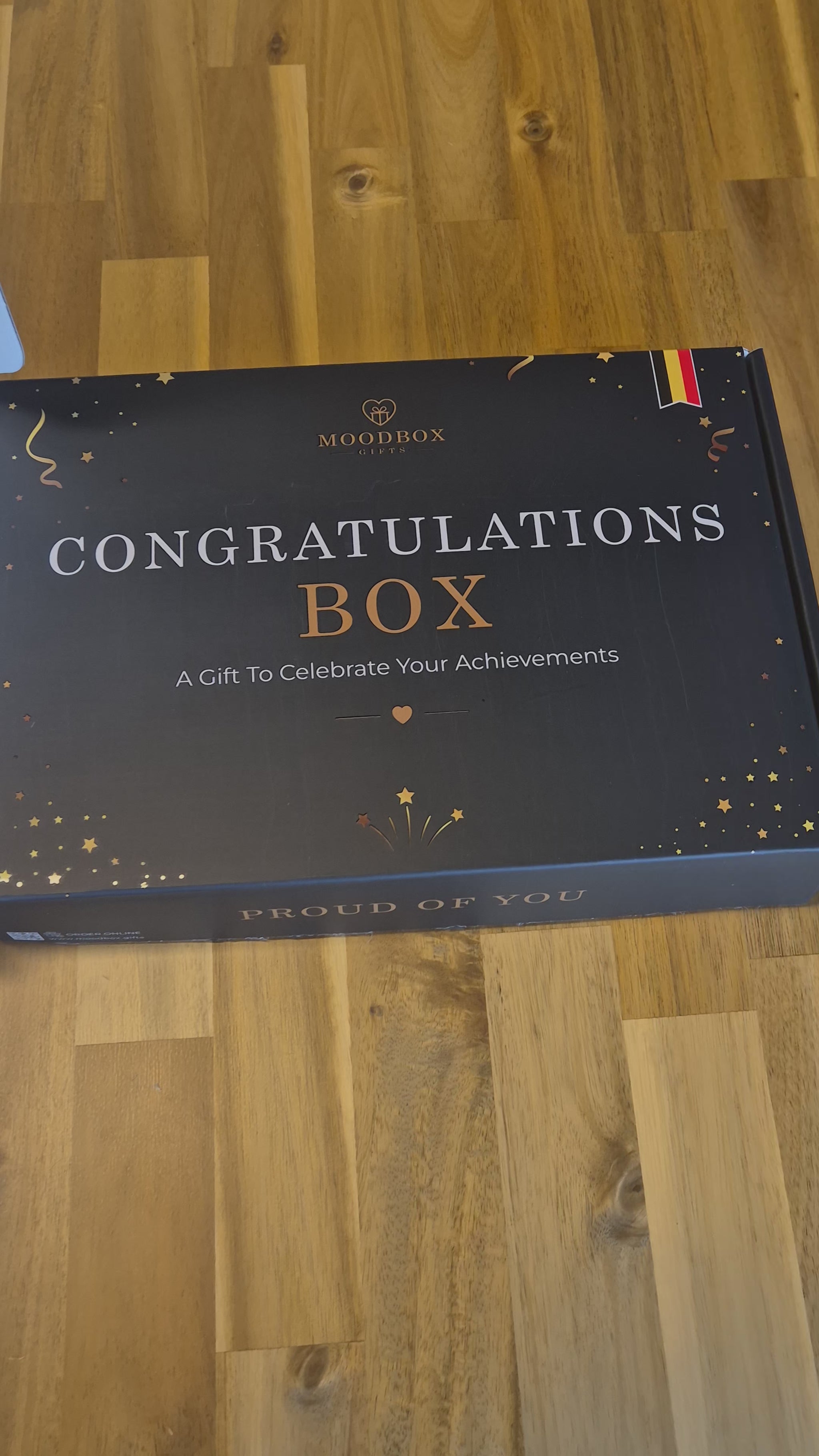 Moodbox Congratulations Gift Box filled with Belgian chocolate, premium coffee, tea and carefully selected sweet treats, presented with an elegant personalized message card. Perfect for celebrating a new job, graduation, promotion, achievement or special milestone, with delivery across Europe.