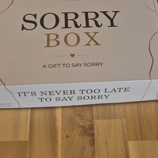 Moodbox Sorry Gift Box featuring Belgian chocolate, premium coffee, tea and delicious sweet treats, presented in an elegant gift box with a personalized message card. A thoughtful way to say sorry, make amends or send a sincere gesture to someone important, with delivery across Europe.