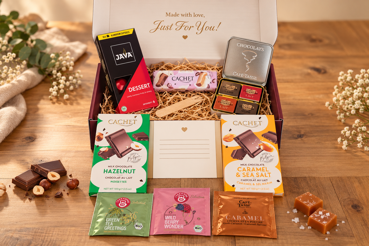 Moodbox Gift Box featuring Belgian chocolate, premium coffee, tea and delicious sweet treats, presented in an elegant gift box with a personalized message card. 